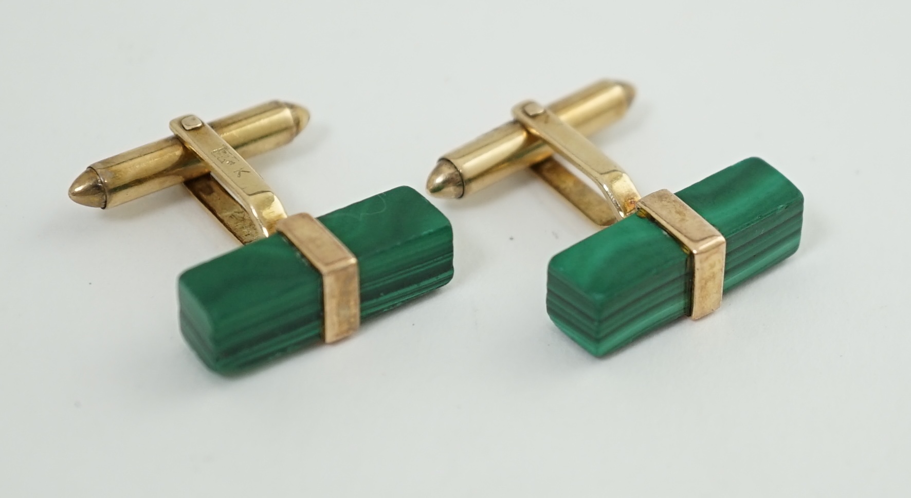 A pair of Chinese 9k gold and malachite set cufflinks